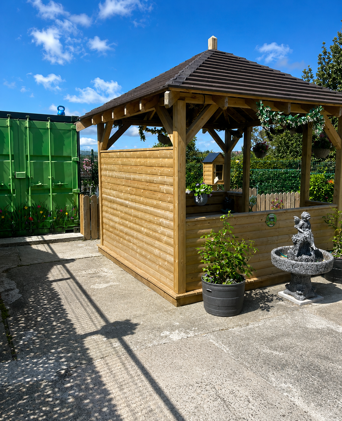 Greenhouse and growing area in Leafair Community Garden