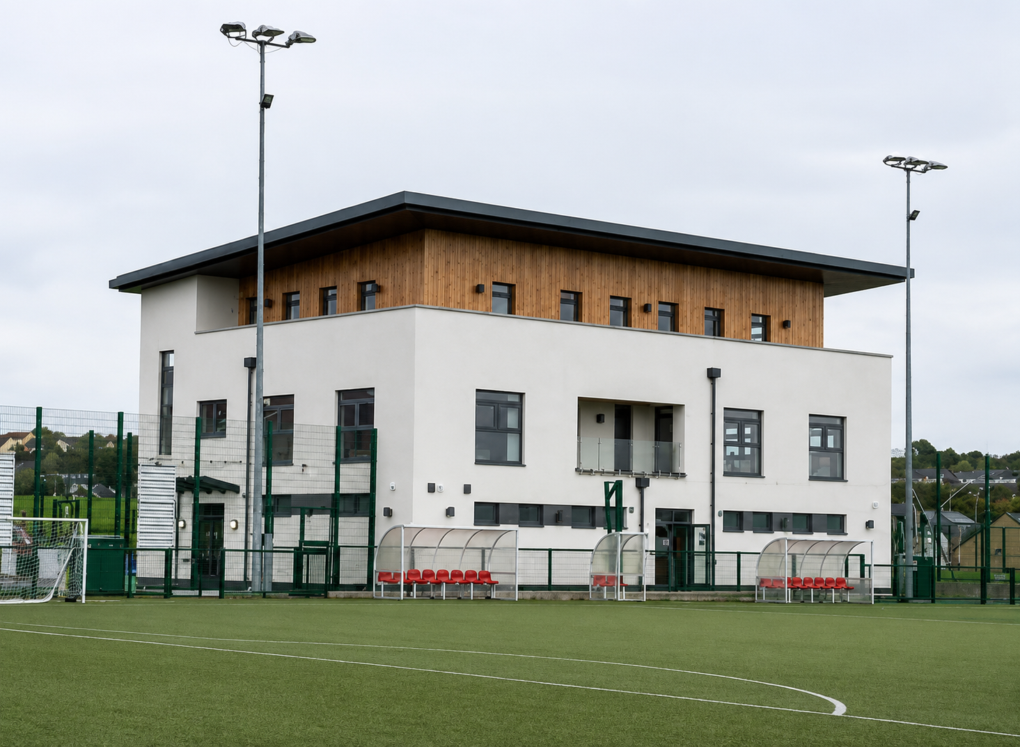 Leafair Well-Being Village building beside the community pitch